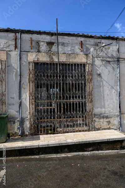 Obraz Warehouse Gate Secured with Metal Mesh Fenc