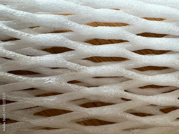 Fototapeta Closeup of a white foam net