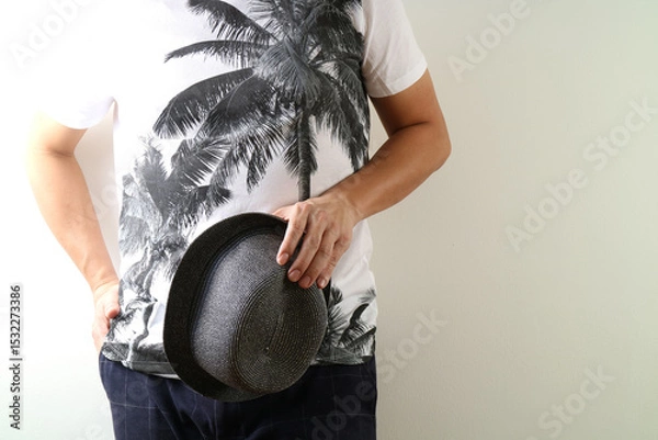 Fototapeta Casual Summer Outfit with Palm Tree Print and Hat
