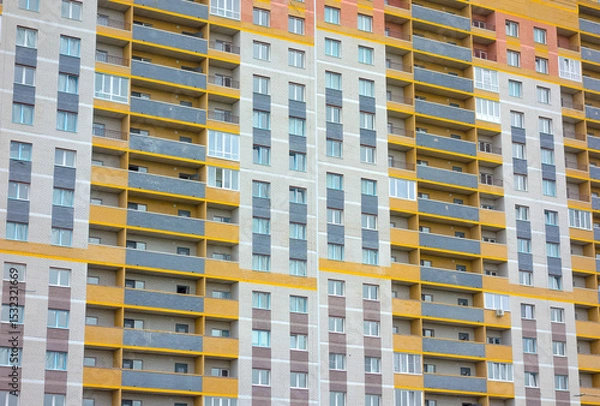 Obraz Close-up, facade finishing of a new building, construction of a new multi-storey building