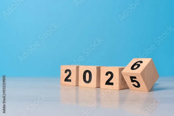 Obraz Flipping of wooden cube block for change 2025 to 2026 year , Preparation for merry Christmas and happy new year concept