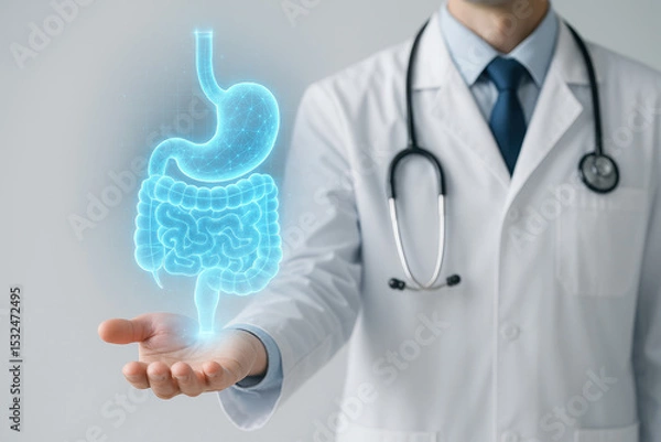 Fototapeta Holographic digestive system projection floating above hand of medical professional wearing white coat and stethoscope, symbolizing advanced healthcare and anatomy study
