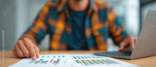 Obraz Analyzing data trends for business growth office environment report analysis focused viewpoint financial insights