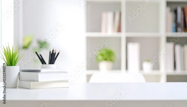 Fototapeta Modern workspace with books and plants (1)