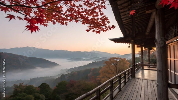 Obraz Traditional wooden terrace on the right side, overlooking a misty mountain valley at sunrise. Red maple leaves frame the top right corner, creating a serene and poetic autumn scene with soft pastel sk