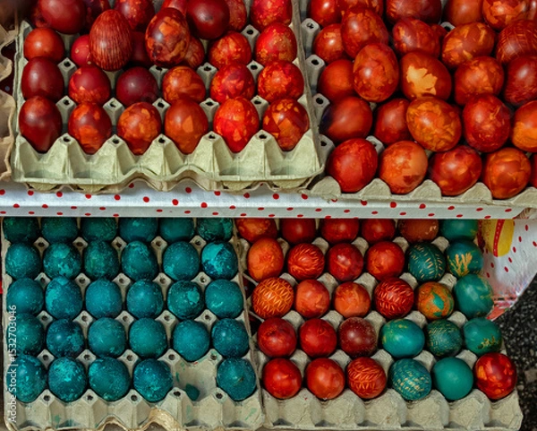 Obraz Colorful cooked and coloured Easter eggs outside on a market