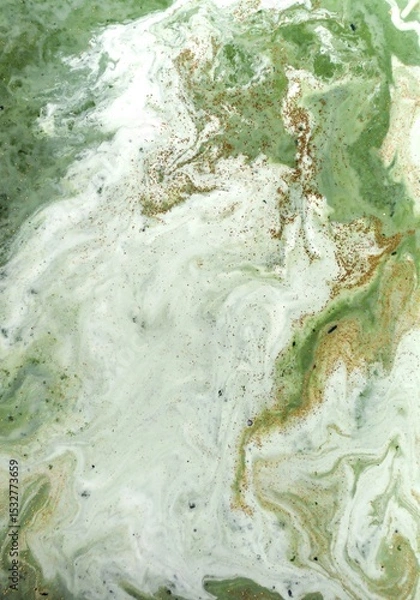 Fototapeta Abstract art featuring a swirling mix of green white and gold colors paint