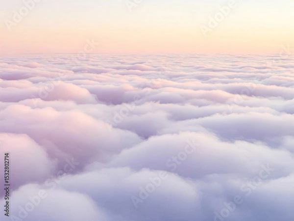 Fototapeta Dreamy skyscape featuring fluffy, pastel-colored clouds in shades of pink, purple, and white against a soft sunset collored sky
