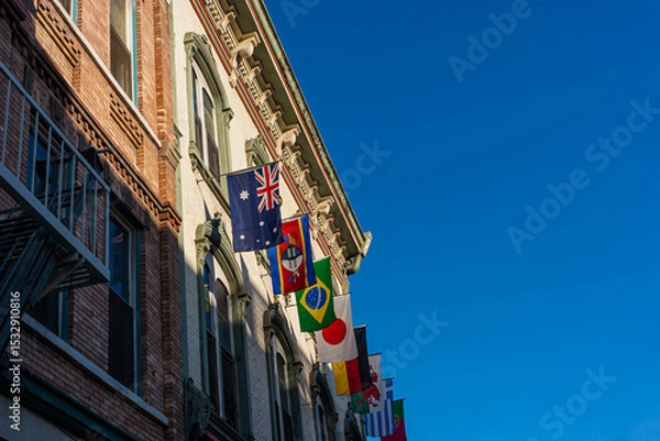 Fototapeta International Flags and  Victorian Style Architecture in The Historic Gaslamp Quarter, San Diego, California, USA
