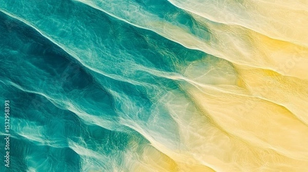 Obraz Aerial view of turquoise water meeting a sandy beach creating abstract patterns.