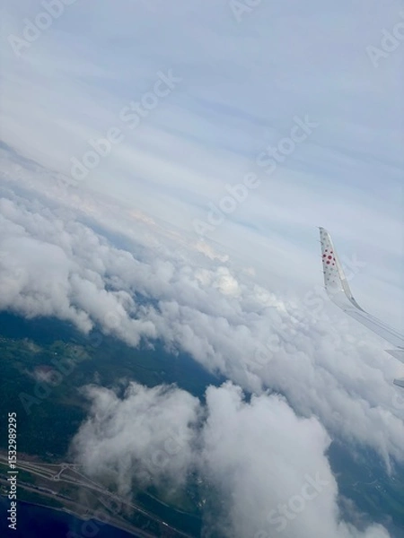 Fototapeta Flying over the clouds