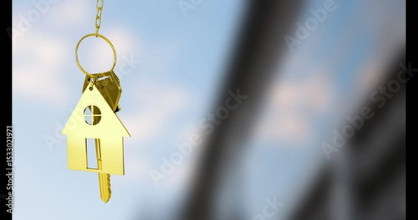 Obraz Dangling gold house-shaped keyring charm at modern building facade, with attached keys, copy space