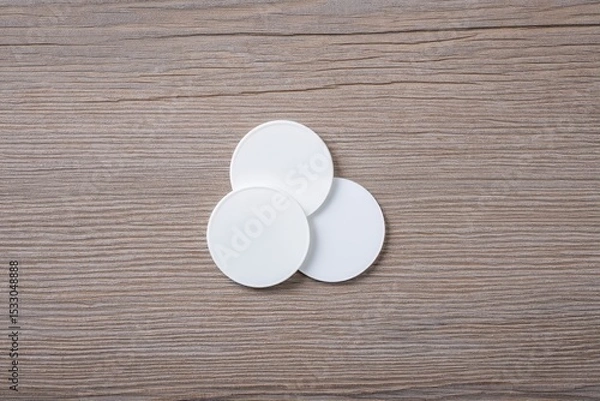 Obraz White circle paper and space for text on old wooden background.