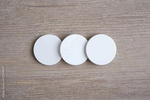 Obraz White circle paper and space for text on old wooden background.