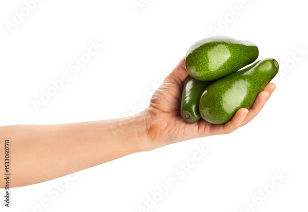 Fototapeta long avocado in hand path isolated on white