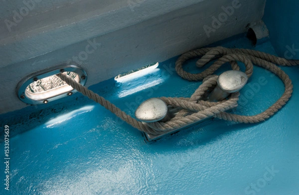 Fototapeta rope and mooring pins, inside the ship