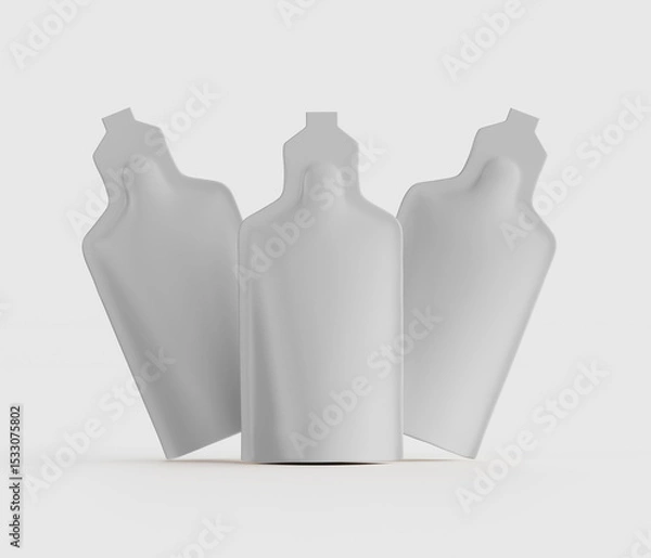 Fototapeta Clean and minimalist rendering of several white blank food or drink pouches for packaging or product presentation on neutral background with copy space