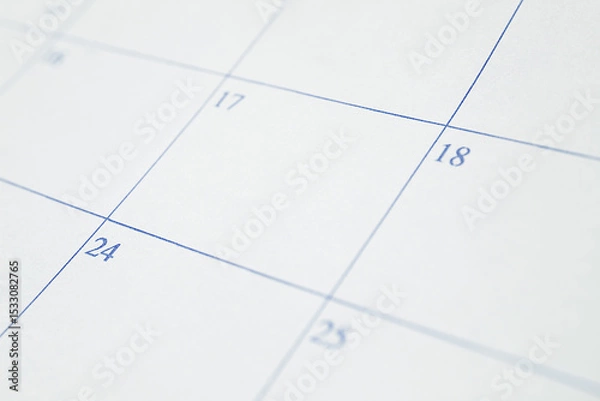 Fototapeta Close-Up of Calendar Page. Blank Date Grid for Planning and Scheduling. Stock photo.