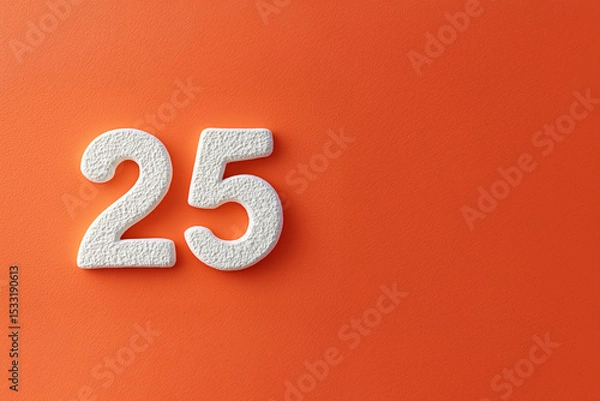 Obraz Chiffres blancs texturés formant le nombre 25 sur fond orange vif avec espace négatif à droite pour design graphique ou communication visuelle
