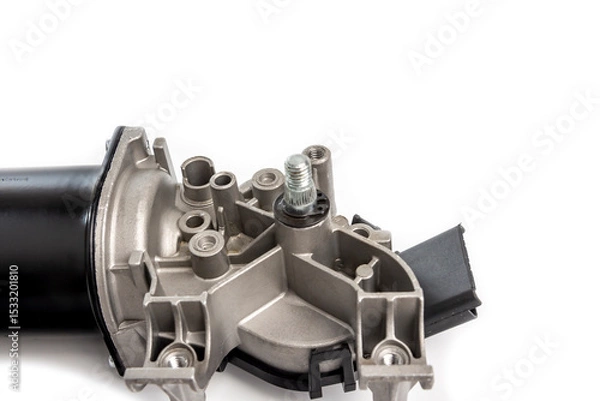 Fototapeta Auto parts for car repairs. An electric motor with a gearbox and a spline rod for the car wiper blade mechanism. 