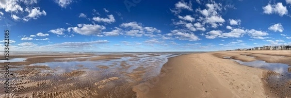Fototapeta Minimalist scene of a flat beach with wet sand, reflecting ambient light. 