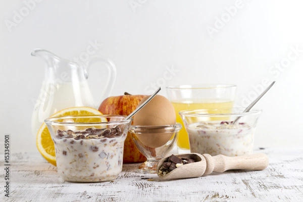 Fototapeta breakfast time with muesli and orange juice