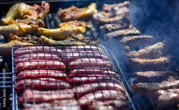 Obraz the meat on the barbecue almost ready for the joy of adults and children