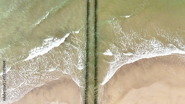 Fototapeta Breakwater on the North Sea photographed with a drone