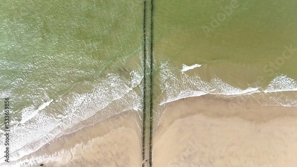 Fototapeta Breakwater on the North Sea photographed with a drone