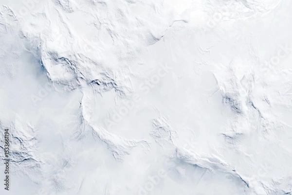 Fototapeta High-angle view of a vast, snowy landscape.  Snowy mountains and valleys are visible.  A textured, pristine white expanse