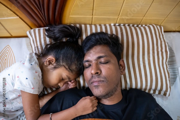 Obraz Father and daughter share a peaceful moment while sleeping