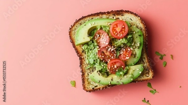Fototapeta Delicious avocado toast topped with fresh tomatoes and sesame seeds. A vibrant and healthy breakfast or snack option.