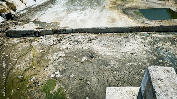 Obraz Dry Polluted Canal with Algae.