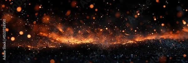 Obraz Fiery embers and particles over a black background, in the dark of night, realistic photography.