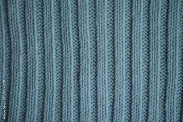 Fototapeta blue texture of knitted fabric, macro texture of blue woolen fabric, geometric knitted pattern of crocheted elastic as a background