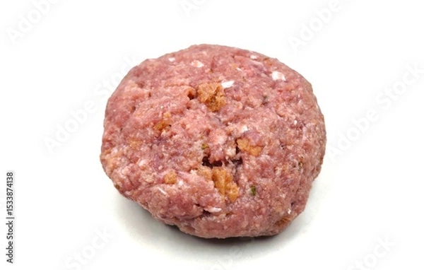 Fototapeta Closeup view of a raw patty (Bifteki in Greek), round and flat, made from beef meat, isolated on a white background, ready for cooking or preparation.