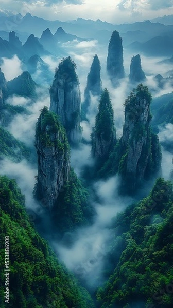 Fototapeta Zhangjiajie mountain forest covered with fog high resolution picture