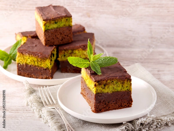 Fototapeta chocolate cake slices with pistachio and kadayif layer