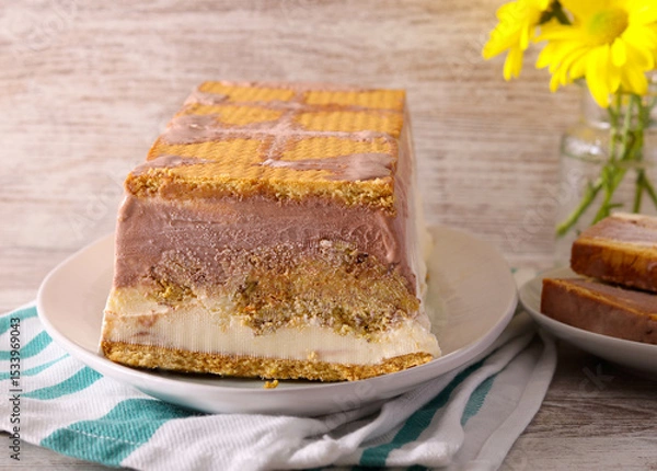 Fototapeta  cake with chocolate, vanilla and pistachio layers