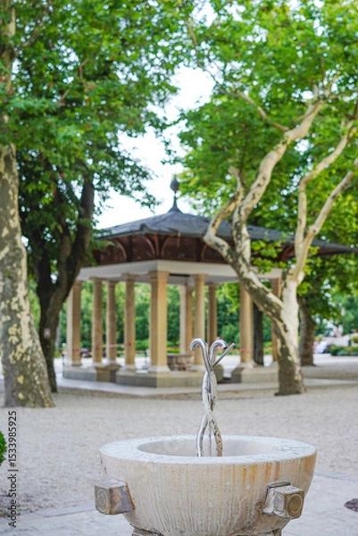 Fototapeta Balatonfured, Hungary.Drinking fountain built in the 1802, a medicinal water source, played a key role in the development of bathing culture and health tourism.
