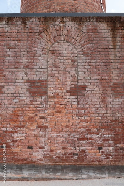 Fototapeta Öffnung in einer Ziegelwand wurde mit Ziegelsteinen zugemauert