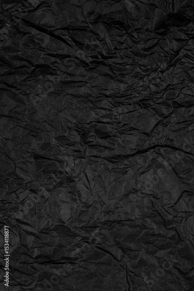 Fototapeta Crumpled Black Paper Texture. Dark Wrinkled Background. Stock photo.