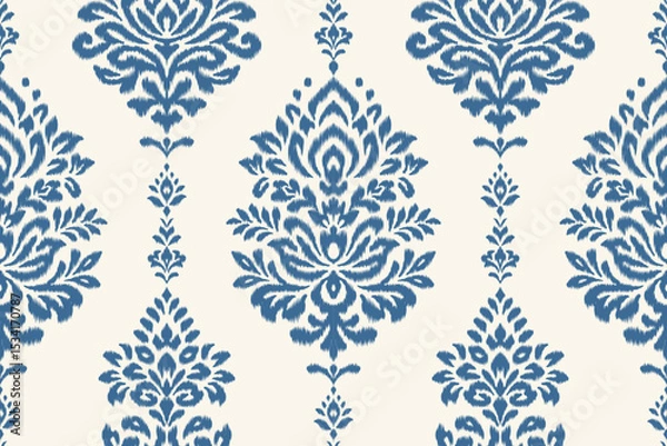 Obraz Ikat floral seamless pattern with traditional ethnic decorative border in blue on cream background, perfect for fabric, clothing, decoration, wallpaper, Aztec abstract textile texture illustration.