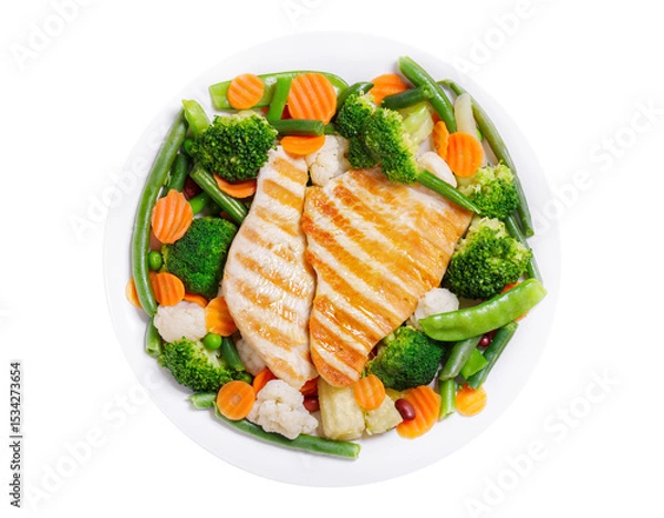Fototapeta plate of grilled turkey and mix of steamed vegetables isolated on transparent background, top view