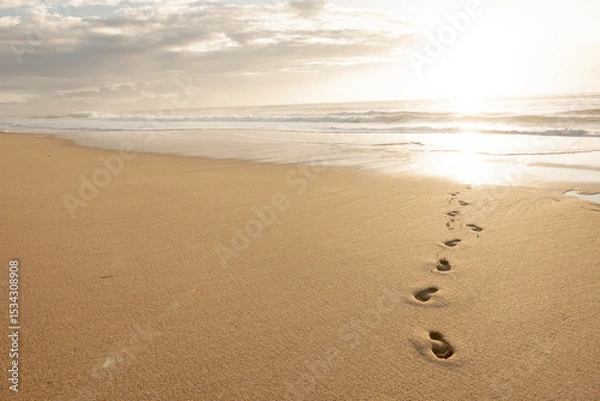 Obraz Fußsspuren im Sand an einem Goldenen Strand