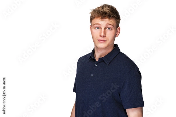 Obraz Man in navy polo t-shirt on white background with smile.