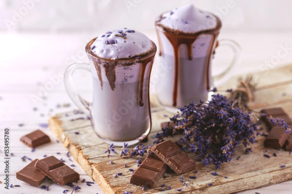 Fototapeta Cappuccino with lavender and chocolate syrup and flowers