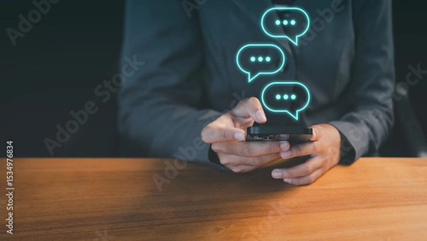 Fototapeta Young woman using a smartphone with technology smart robot AI chatbot for chat. Digital chatbot are assistant conversation for provide access to data growth of business in online network.
