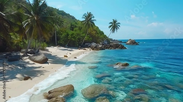 Obraz A secluded tropical beach with coconut trees, colorful coral reefs, and crystal-clear water