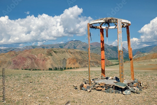 Fototapeta Religious wooden construction in Altai mountains.  In the background is visible Mount Sukor